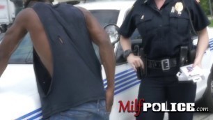Huge titted cops give a nice blow job to a black dude