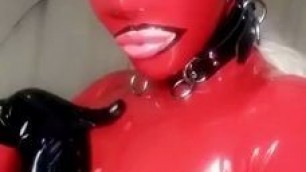 latex woman in red