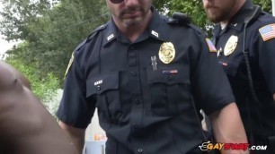 Horny Cop is being fucked hard by BBC criminal under the sunlight.