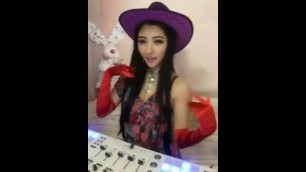 Woman in Red Satin Gloves DJ