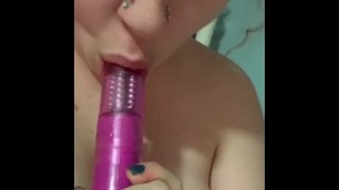 Teen with GG cup tits sucks off dildo and tit wanks it