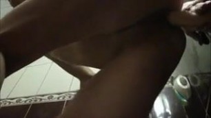 Russian whore sucks cock and plays with dildo in bathroom.