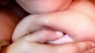 Chubby girl licks her own nipple