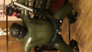 Green and green - swinged rubberslave with electro