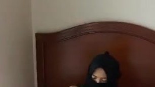 hijab wearing Tudung slut playing with her toy