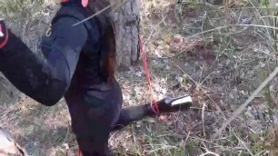 Tied to a tree on a sexy outfit&comma; masked and outdoor deepthroat with no mercy