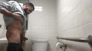 Hot big cock coworker caught on hidden cam peeing in employee restroom