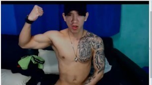 latino twink with nice tattos jerk his huge uncut dick and cum on his belly