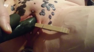 Sub slut punishing herself with wax and spankings
