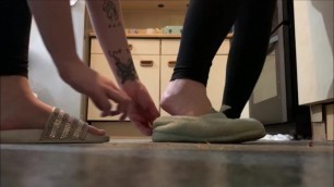 mother and daughter crush locusts bugs in shoes and barefoot