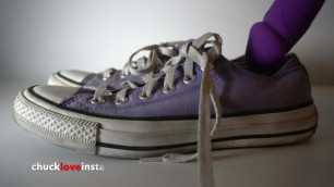 Abusing a pair of purple CONVERSE with a DILDO