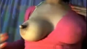 Big tits babe teasing with her huge nipple