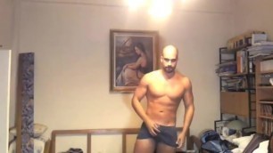 Greek guy undresses