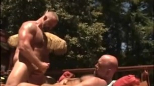 Muscle bears fuck near the pool