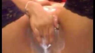 Squirting latina fisting and toying her pussy